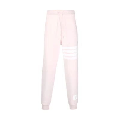 THOM BROWNE SS22 Pink Knit Jogger Pants with Four-Bar Stripes. MJQ008H-00535-680-3