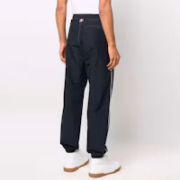 Shop THOM BROWNE SS22 素色抽繩針織運動褲 深藍黑長褲。 MJQ150-A0765-1415