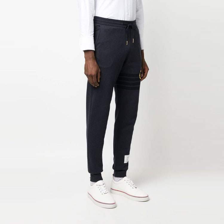 Shop Pantalones de chándal bloque de color a rayas THOM BROWNE SS23 Navy. MJQ171E-J0010-415