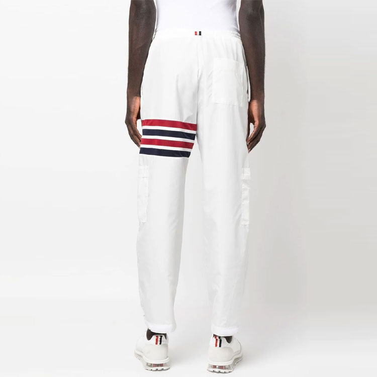Shop Thom Browne SS23  White Lightweight 4-Bar Track Pants with Self-Packable Design. MJQ163A-F0197-100