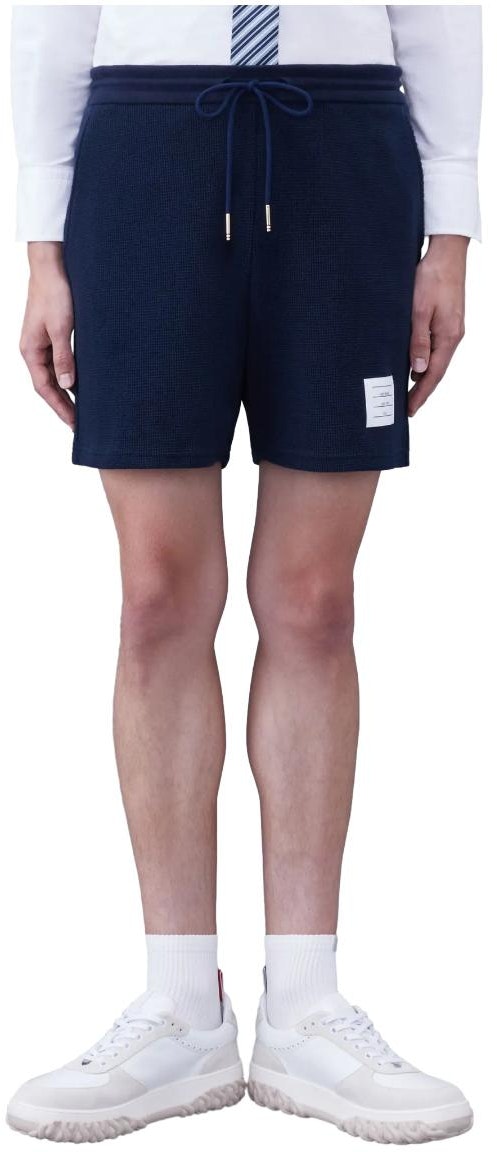 thom-browne-ss-24-navy-blue-textured-cotton-casual-shorts-mjq-188-a-j0114-415