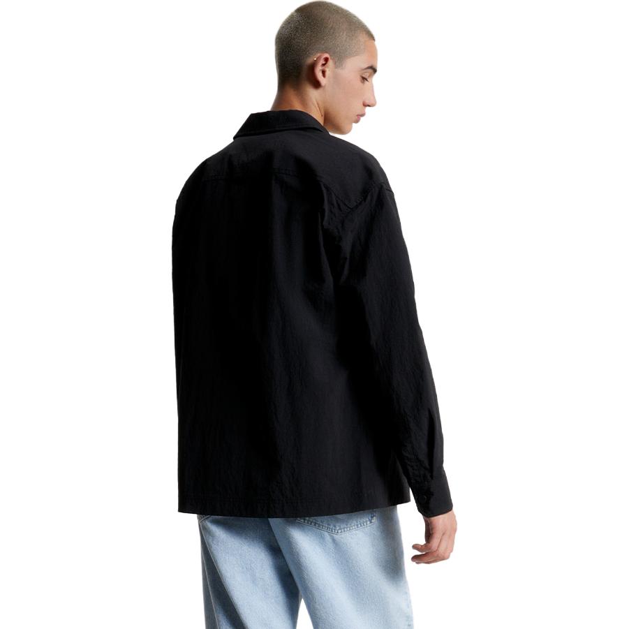 Shop Chaqueta Camisa Tommy Hilfiger Loose Fit con Botones a Presión y Estampado Logo. DM0DM17240