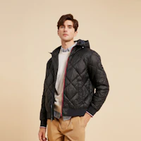 Shop Tommy Hilfiger Colorblock Quilted Hooded Jacket for Men - Slim Fit, Warm Outerwear. 78J9385