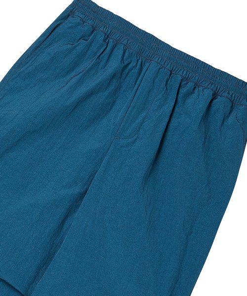 Shop TRAVEL Metal Front Dart Pants Peacock_Jogger Pants Available. TRTTSSNP07UG7
