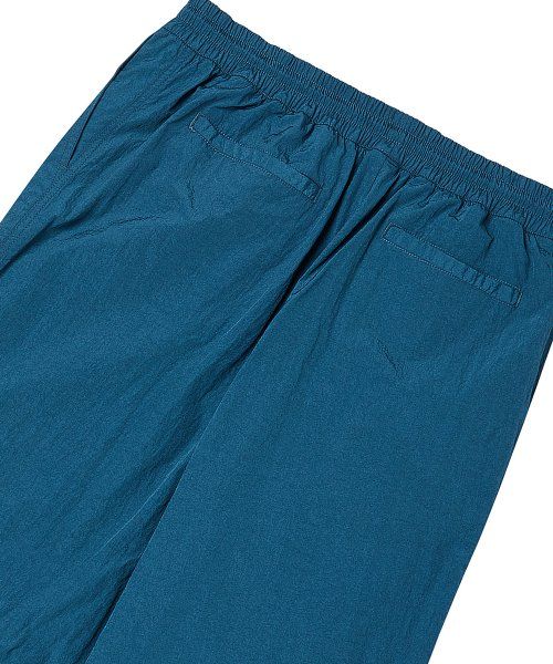 Purchase TRAVEL Metal Front Dart Pants Peacock_Jogger Pants Available. TRTTSSNP07UG7