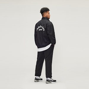 UNDEFEATED FW23 黑色教練外套 男女通用 抓絨內裡 休閒印花款 UE23GWJ02M 4