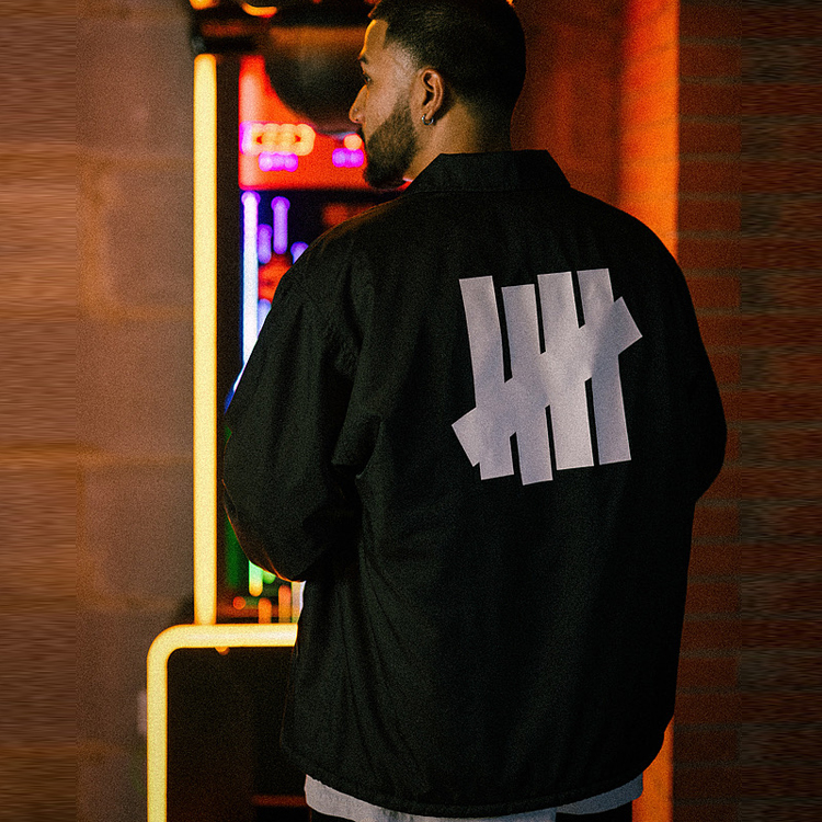 Purchase UNDEFEATED FW23 黑色教練外套 男女通用 抓絨內裡 休閒印花款 UE23GWJ02M