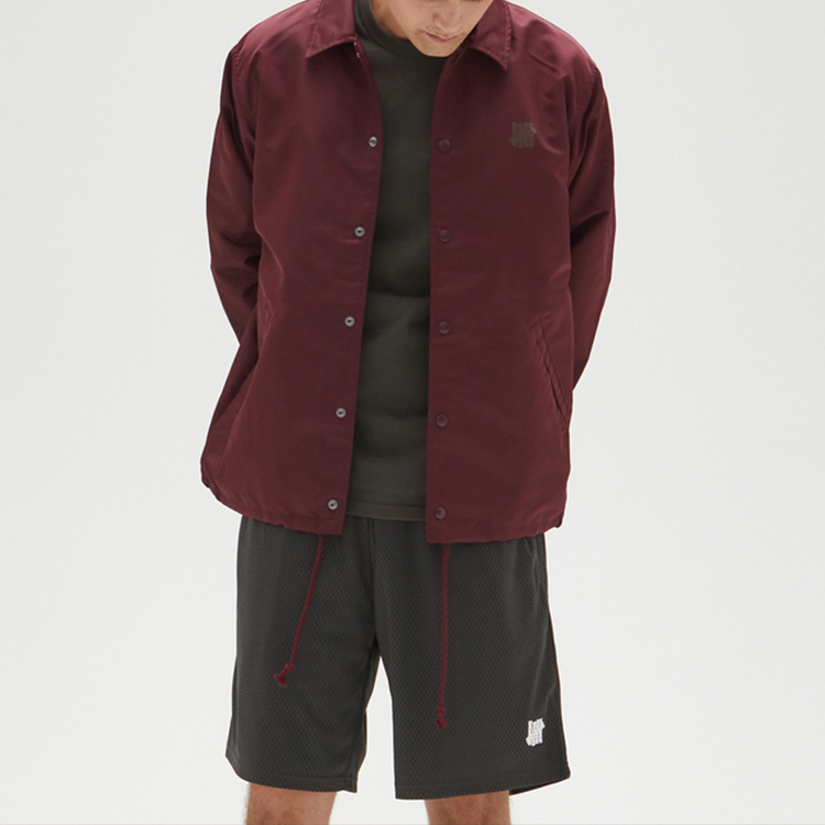 Shop UNDEFEATED FW23 五条杠标志抽绳教练夹克 男女通用 UI33GWJ01M