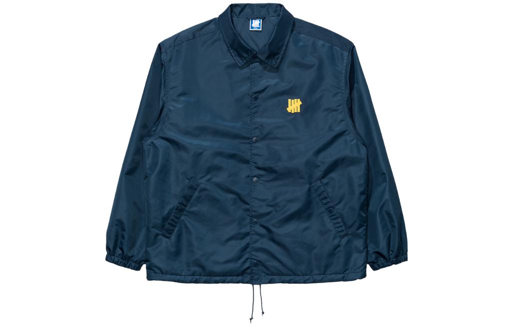 Order UNDEFEATED FW23 海軍藍條紋拼接Logo教練外套 男女款. UC33GWJ05M