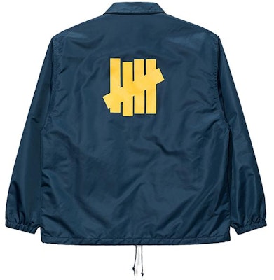 UNDEFEATED FW23 海軍藍條紋拼接Logo教練外套 男女款. UC33GWJ05M Lookbook UNDEFEATED FW23 海軍藍條紋拼接Logo教練外套 男女款. UC33GWJ05M