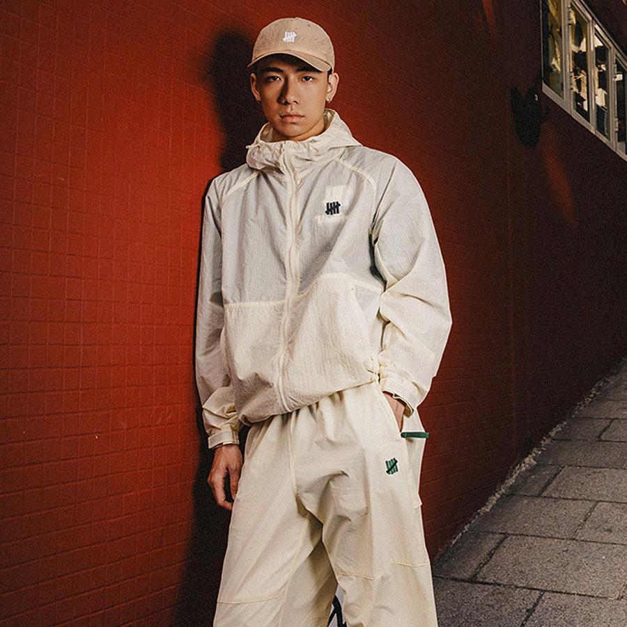 Shop UNDEFEATED SS25 Lightweight UV50+ Water-Resistant Jacket with Logo Design Unisex UC51GWJ12M