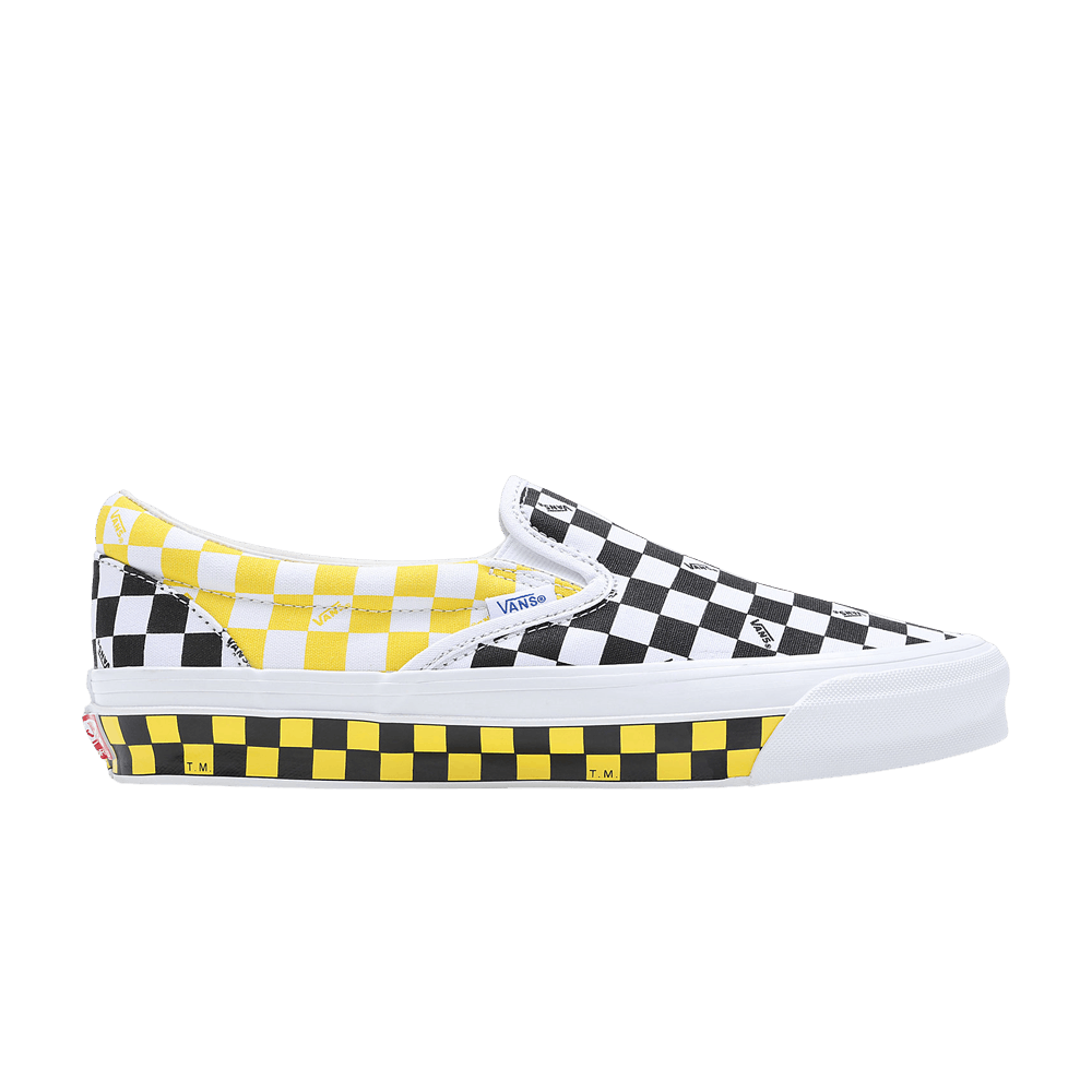 black and white checkerboard vans with yellow stripe