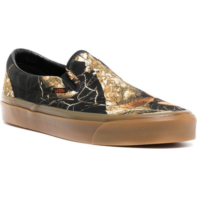 Shop Vans Realtree Classic Slip-On 'Hitam Gum' VN0A7Q580QR