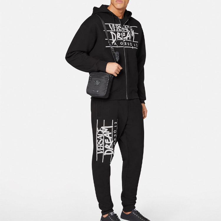 Shop VERSACE  Black Knit Joggers with Solid Color and Letter Print Design. 1005204-1A03493-1B000