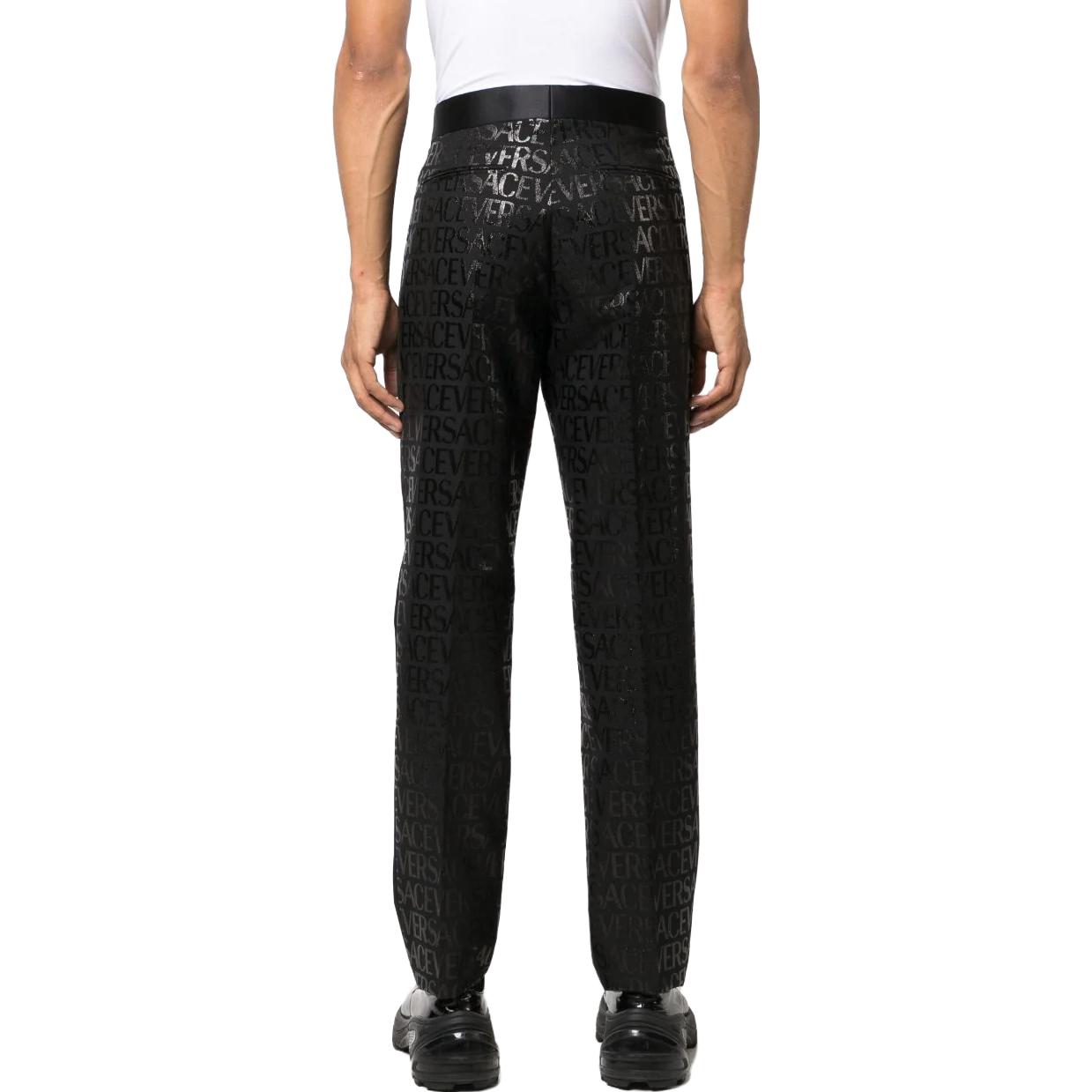 Shop VERSACE  Black Straight-Leg Letter Print Casual Pants. 1010584-1A07652-1B000
