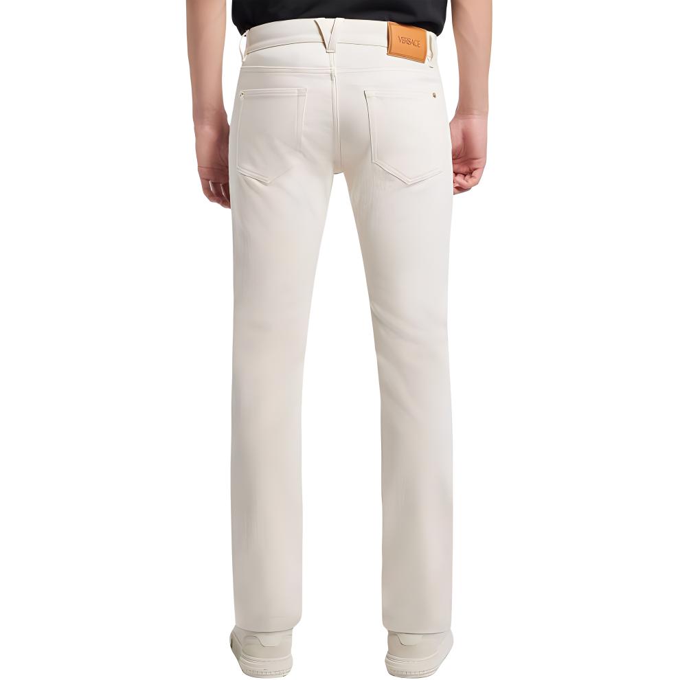 Shop VERSACE  Slim Straight Beige Jeans with Studded Button Details 1011693-1A03458