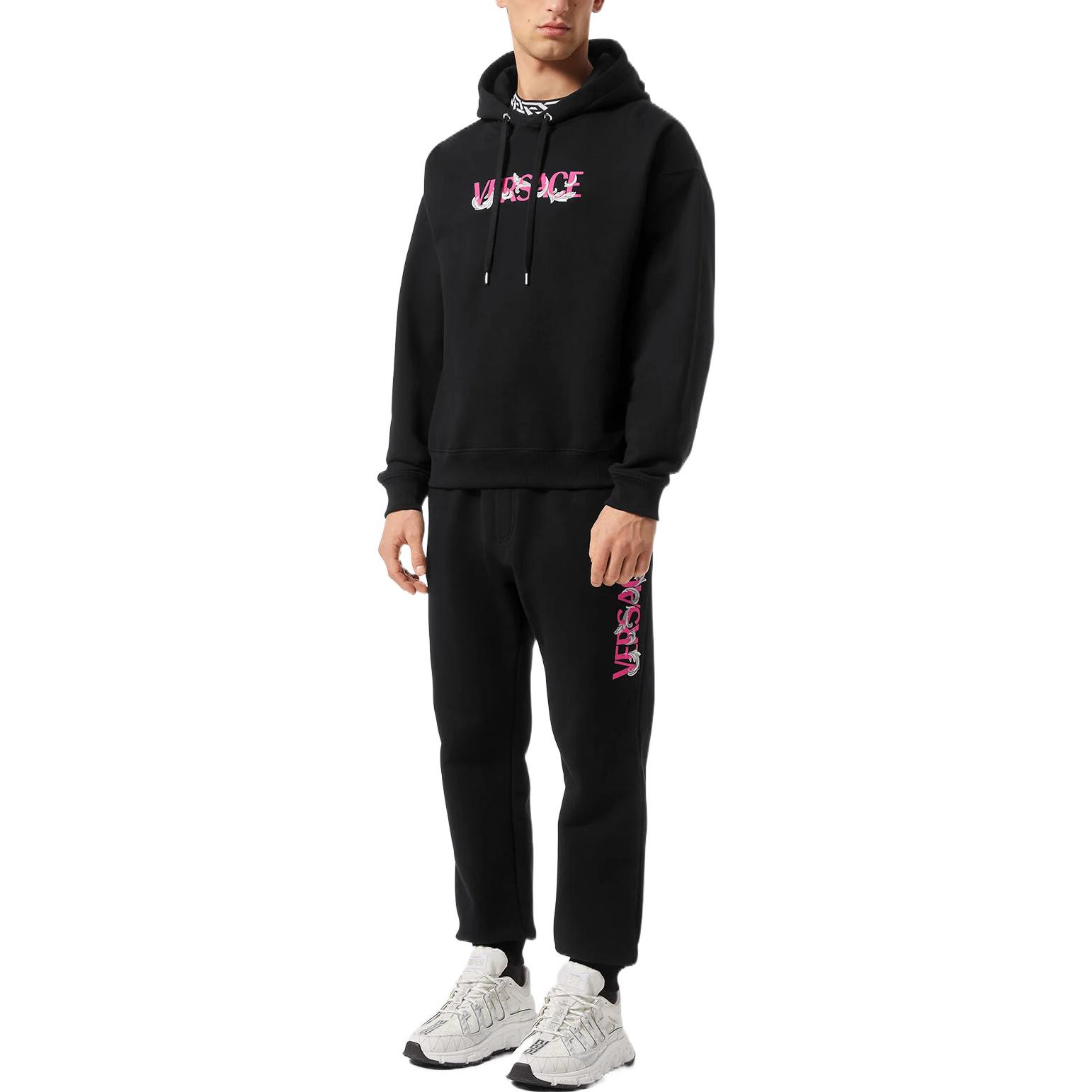 Shop VERSACE FW22  Black Knit Joggers with Letter Print and Mid-Rise Fit. 1006500-1A04510-1B000
