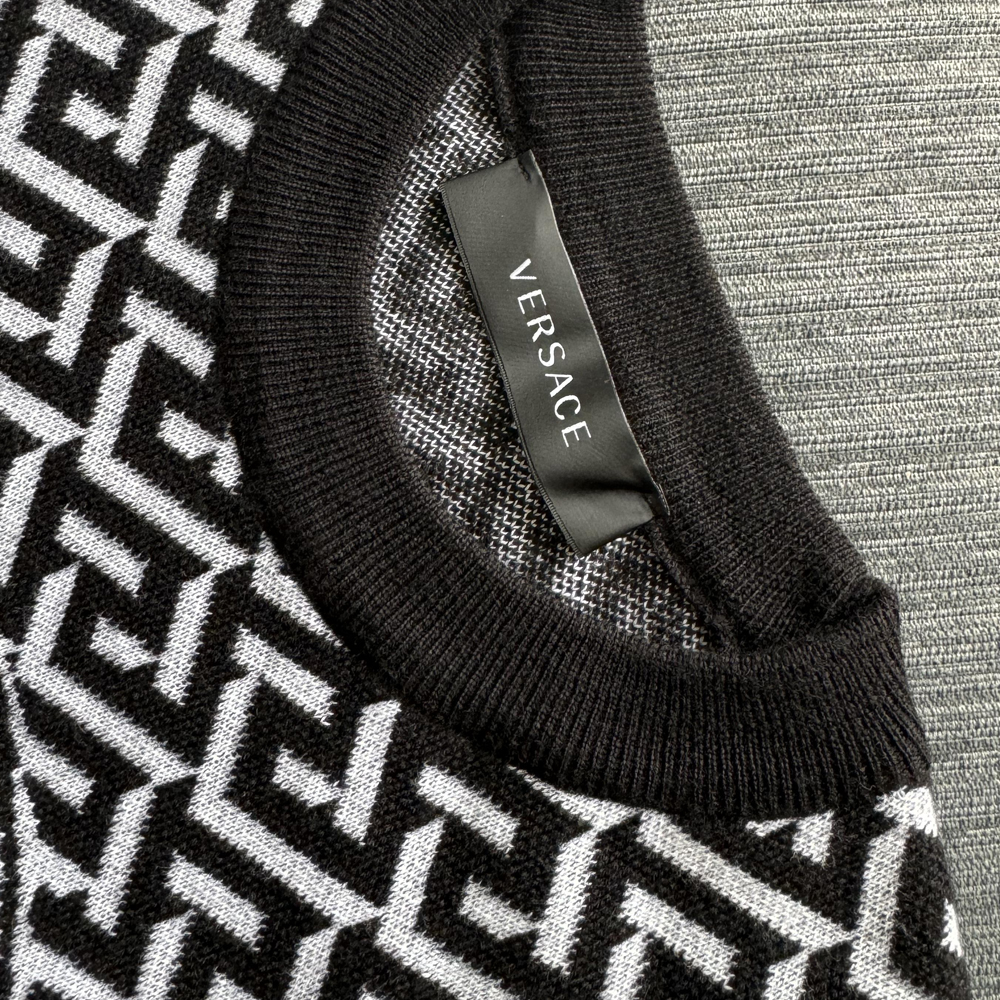 Shop VERSACE FW23  Black Knit Pullover Sweater with Graphic Print. 1012024-1A07316-2B020
