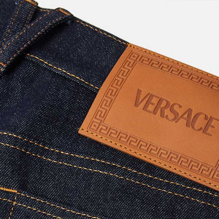 Sizing VERSACE FW23  Slim Fit Mid-Waist Denim Jeans in Dark Blue. 1011693-1A02233-1D100