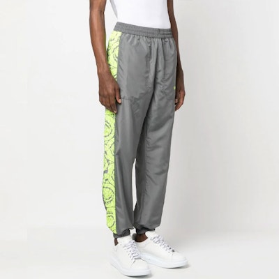 VERSACE SS23 Grey Joggers with Floral Logo Print. 1008148-1A05829-5E150 Purchase VERSACE SS23 Grey Joggers with Floral Logo Print. 1008148-1A05829-5E150