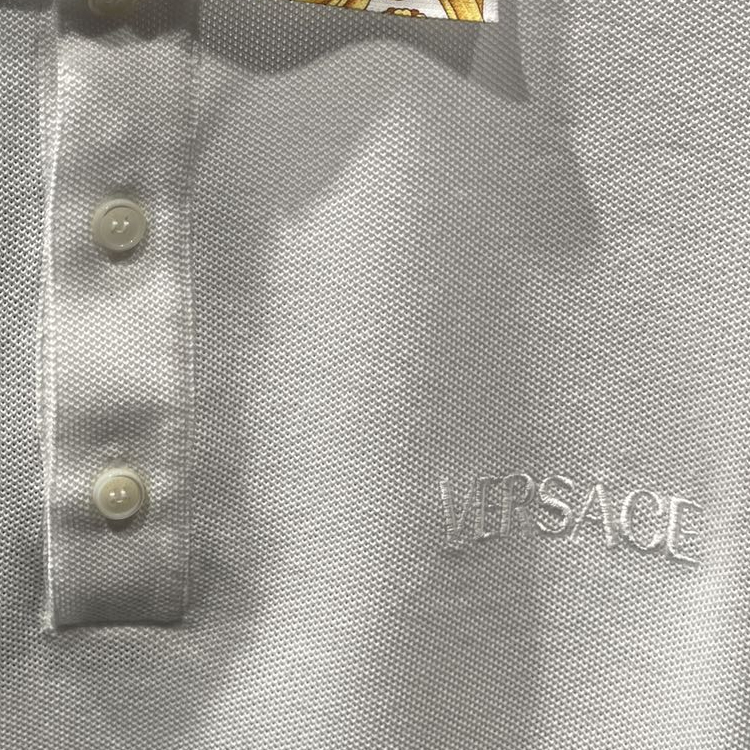 Purchase VERSACE SS24  White Polo Shirt with Embroidered Logo Print Design. 1012260-1A10242-2W110