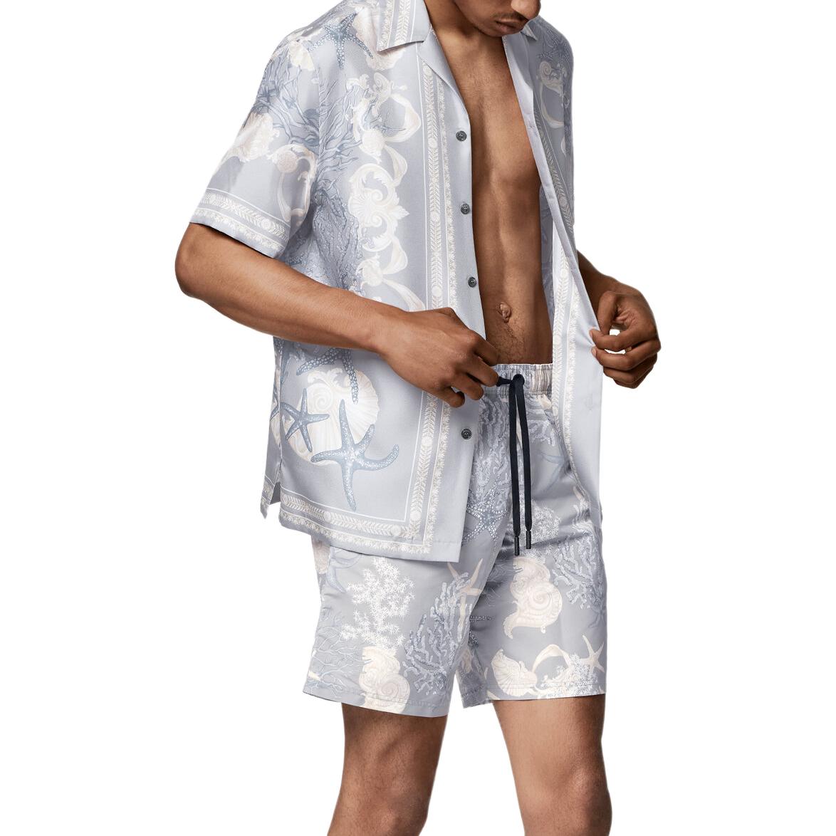 Shop VERSACE SS24 La Vacanza Starfish Seashell Print Blue Beach Shorts Men’s Loose Fit 1016218-1A11347-5E360