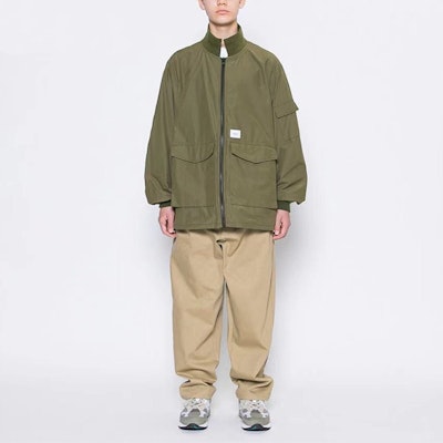 WTAPS Military Green Loose-Fit Stand Collar Jacket with Large Pockets. 202TQDT-JKM01 Shop WTAPS Military Green Loose-Fit Stand Collar Jacket with Large Pockets. 202TQDT-JKM01