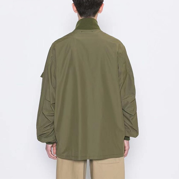 Purchase WTAPS Military Green Loose-Fit Stand Collar Jacket with Large Pockets. 202TQDT-JKM01